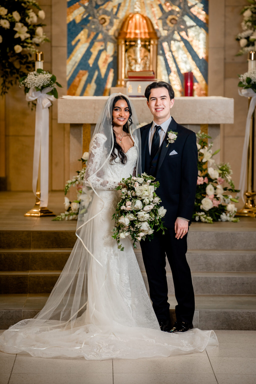 A couple during their wedding day in a church.