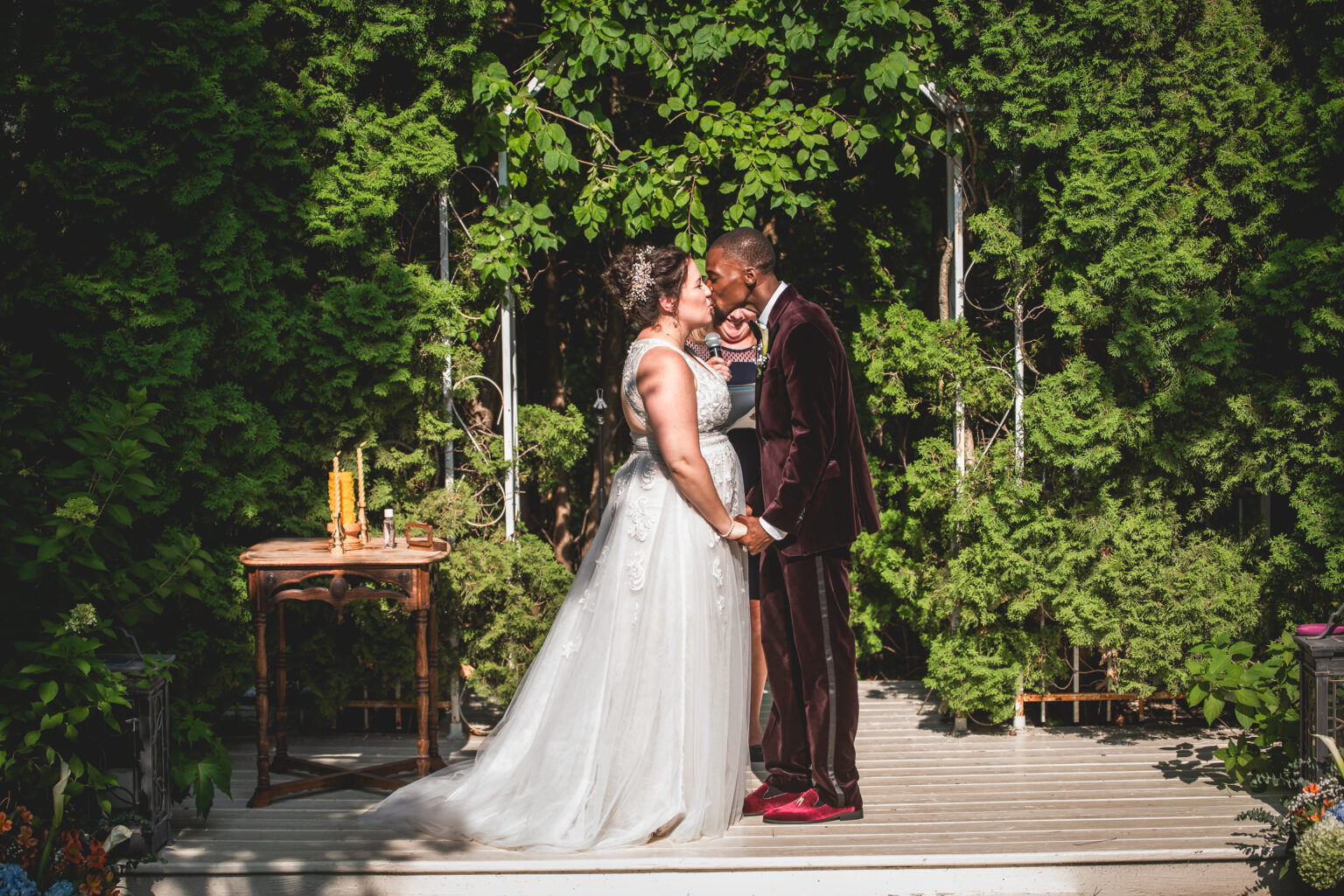 Couple kissing on their wedding day in a garden in wisconsin
