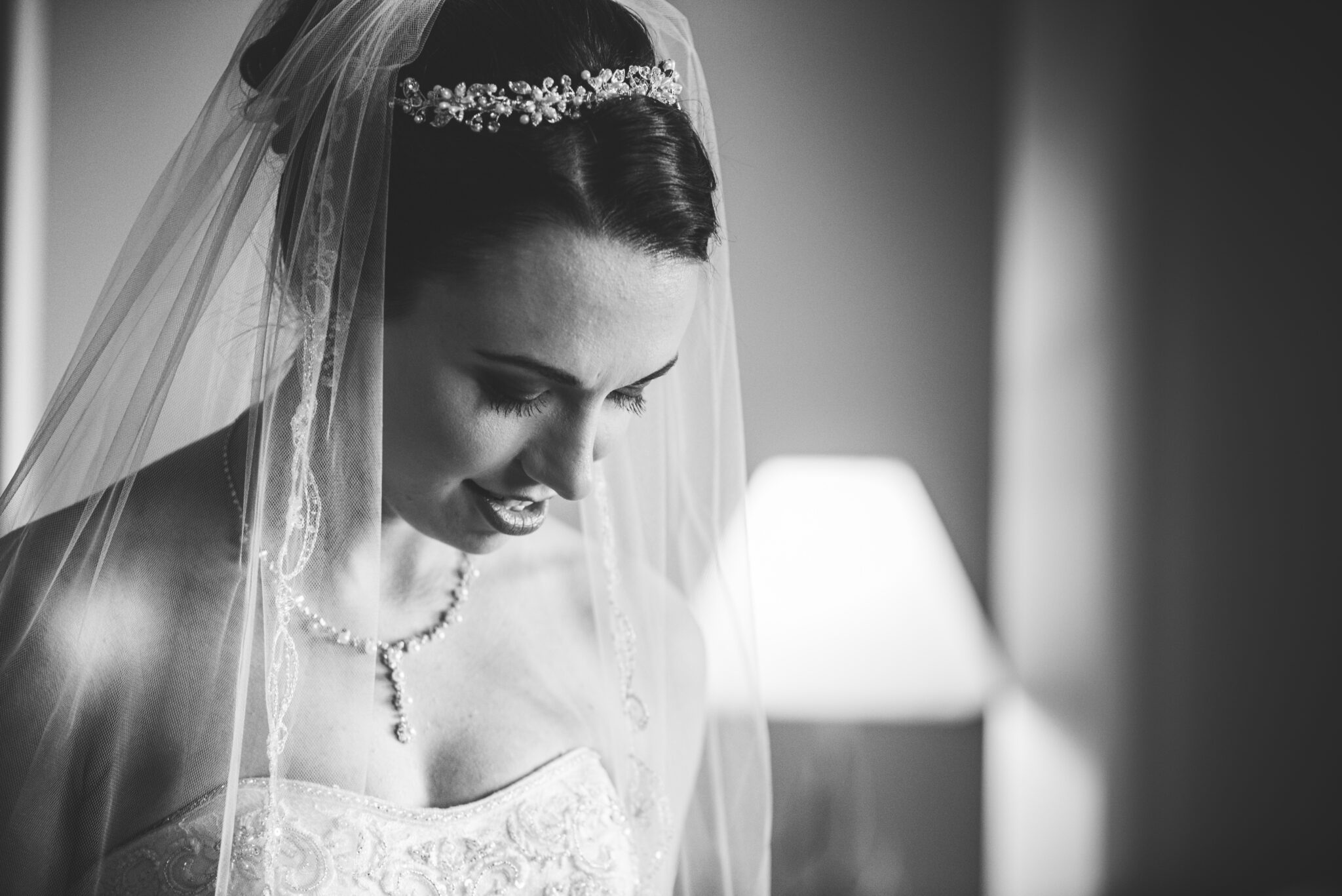 Bride on wedding day looking down in elkhart lake wisconsin