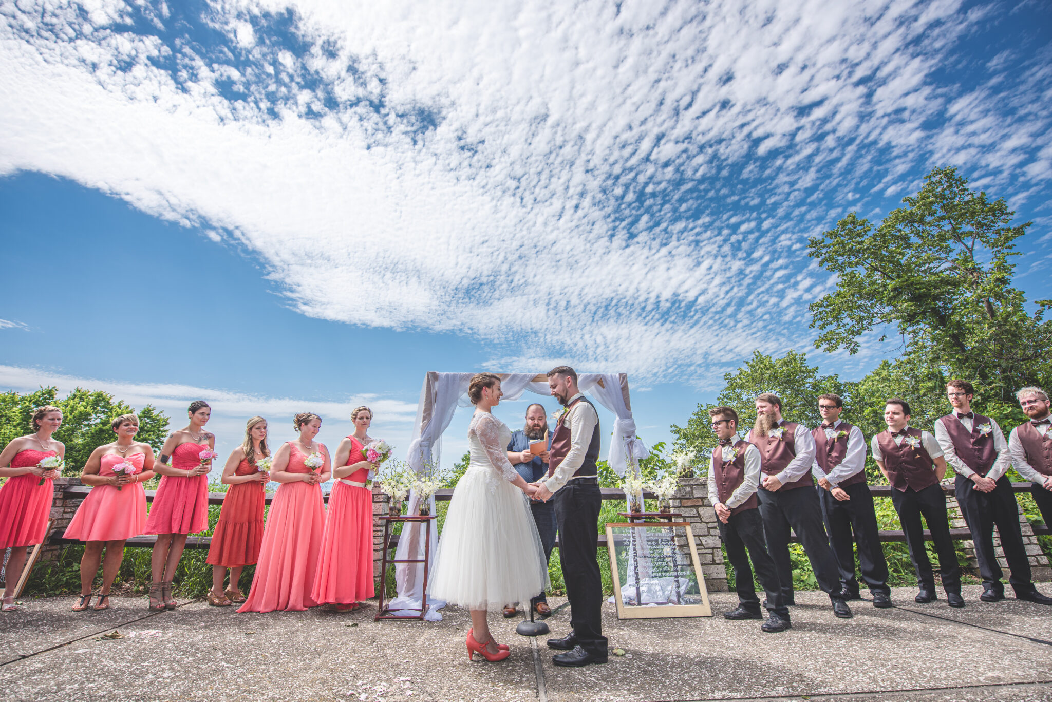 Formal photos of a couple on their wedding day with the wedding party in the fox valley wisconsin