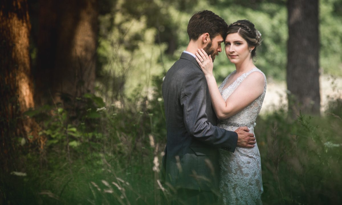 couple in a garden in lake geneva after getting married in wisconsin